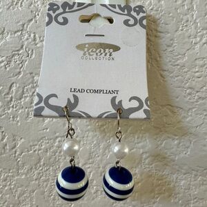 Pierced earrings with small pearl accent